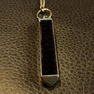 Lane Bryant Gold tone necklace and pendant with black stones.